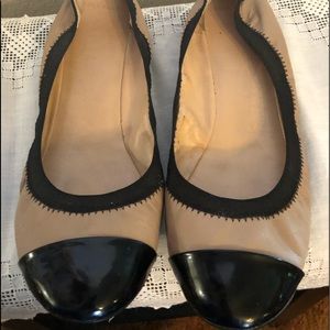 Cole Haan woman’s flats size 10b Tan leather with black toe and trim.